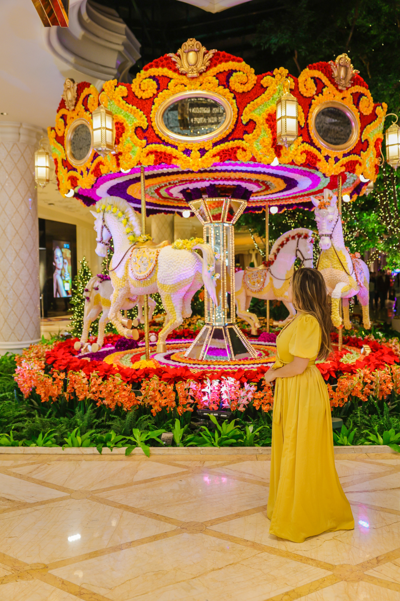 Flower carousel in the lobby of Wynn Hotel is Las Vegas. Photography by Jaz Wanderlust.