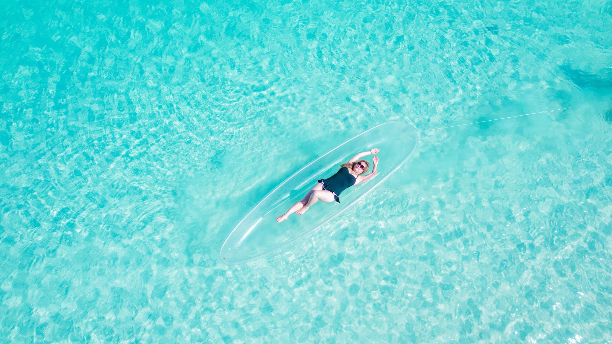 Clear kayak drone photography with Island Adventure TCI in Turks and Caicos. Photography by Jaz Wanderlust.